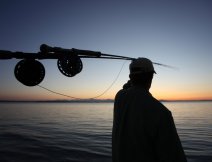 Mike McCoy, aka Dad, watches fish rise out of reach