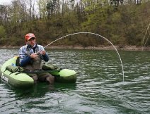 Hard fight with strong still water rainbow from gin clear mountain reservoir.