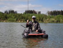 The fight with a nice stillwater brook trout is almost over.
