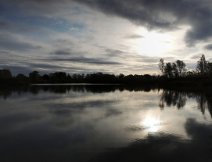 Relaxing early evening on a flooded sand pit. The best moment is yet to come. However, it pays to be at the chosen place earlier and make it impossible for it to be later occupied by enthusiastic evening nudists!