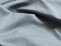 The internal/external surface and material structure of the SolarFlex® hoody in blue-silver color - a very practical color for fishing at sea, where the fisherman merges with the blue sky.
