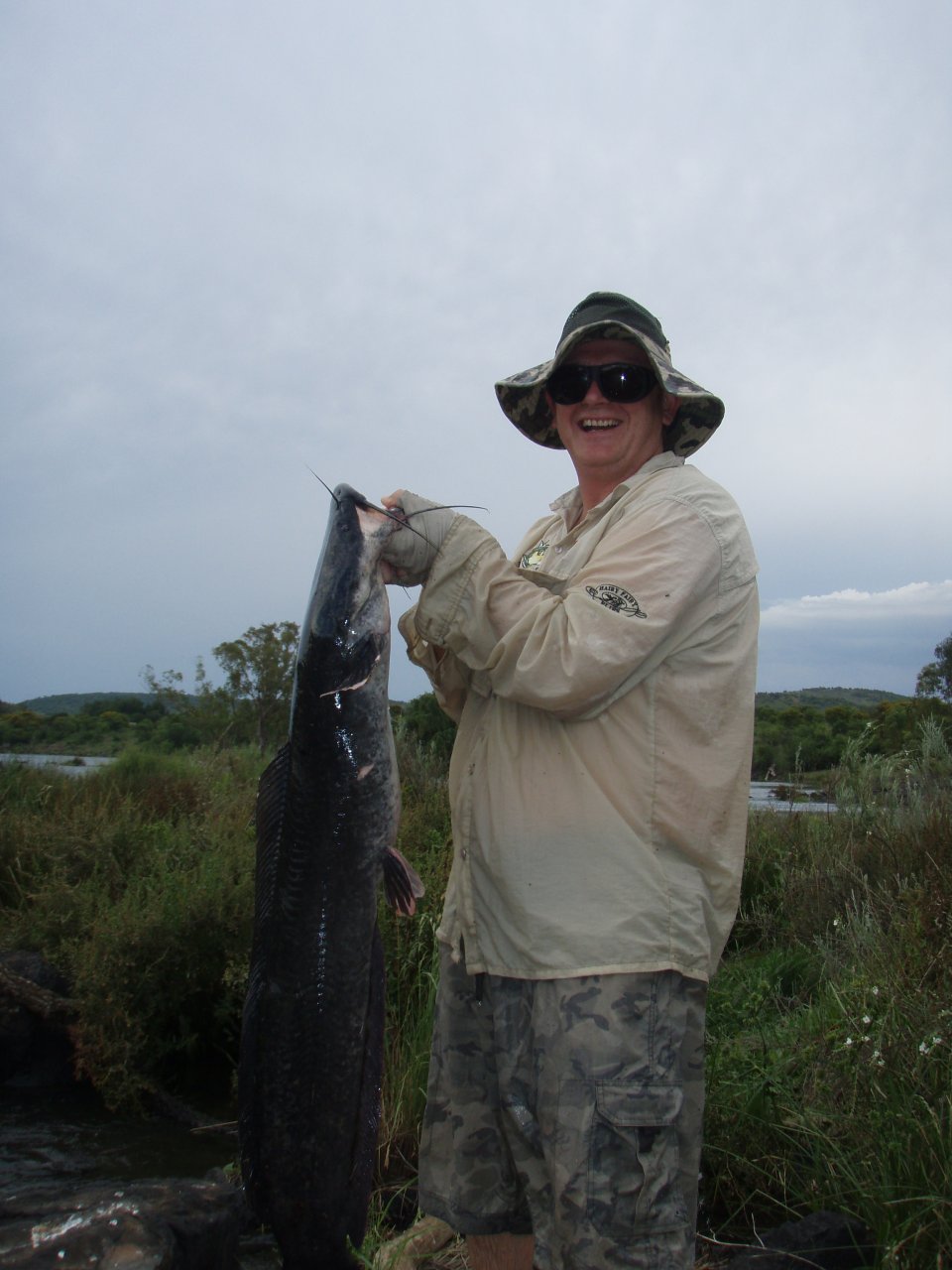 One happy fly fisher with a good sized catfish