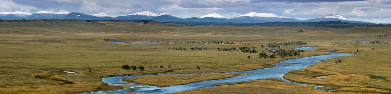 The Rio Grande flows through the meager valley