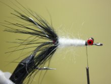 Wrap the yarn up the hook shank to create a body