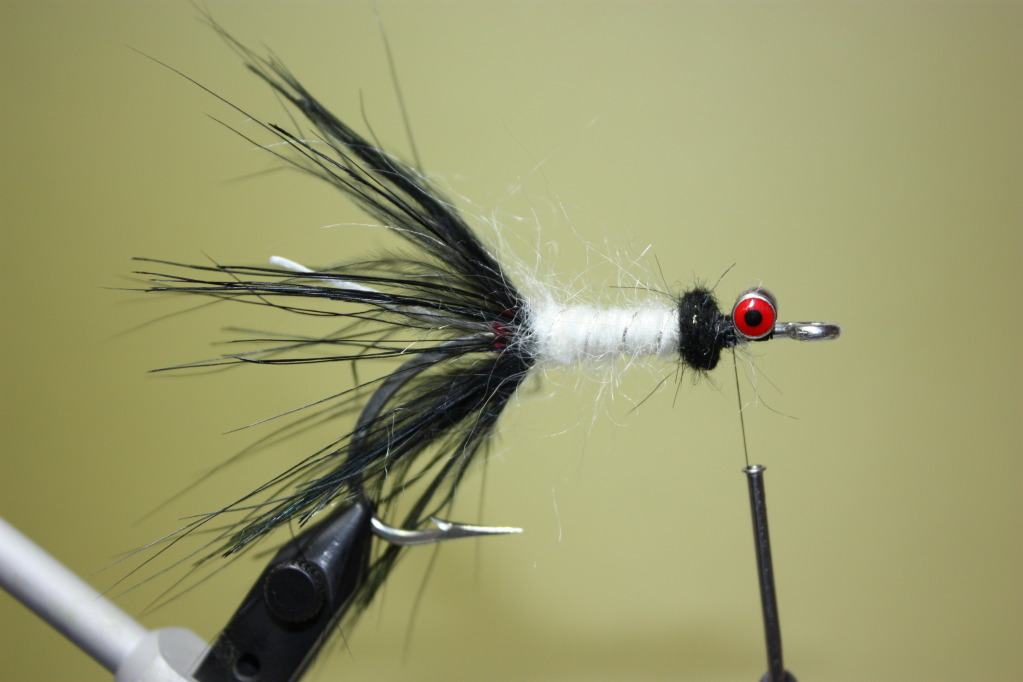 Build a ball of dubbing behind the dumbell eyes