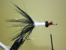 Build a ball of dubbing behind the dumbell eyes