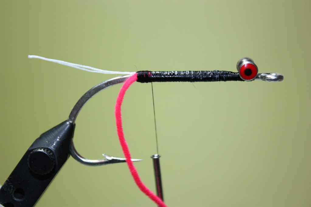 Tie in a length of small chenille.  Make sure to strip the chenille to prevent bulk at the tie in point