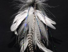 This one is a plain white and black pattern tied with white Chinese cock saddles, White and  black bucktail,grizzlt microbarb saddles and a tightly packed white and black spun deer hair  head