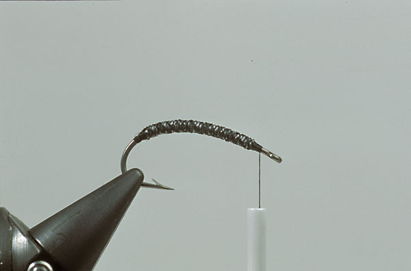 Step1  Put fine lead wire on the hook shank (two layers around the thorax). Optionally coat with varnish