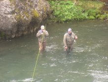 Teamwork is neccessary when fishing for large Atlantic salmon