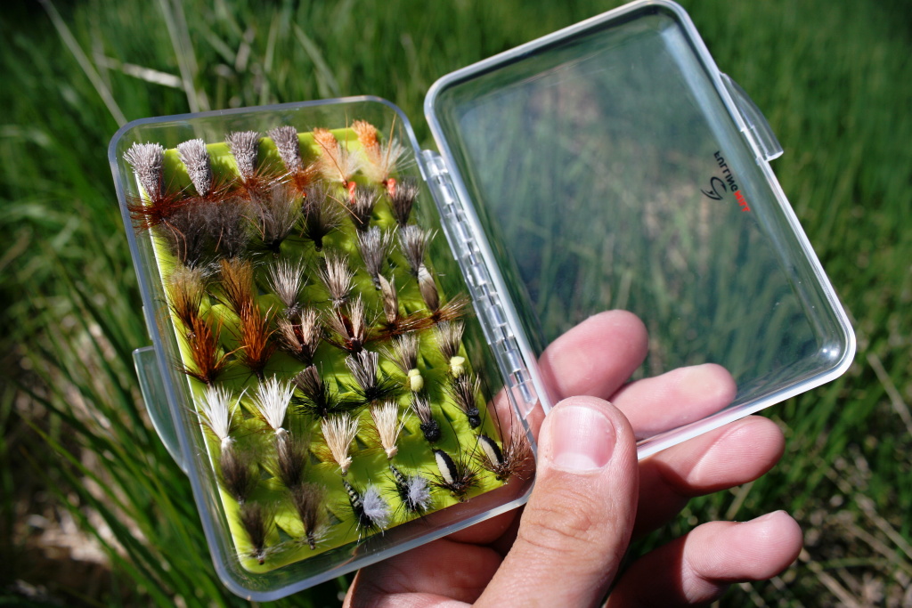 Slim and small Fulling Mill Clear Silicone Box full of flies! Substitute home for my favorite dry flies.