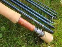 Nice burl wood reel seat and great cork used for the handle.