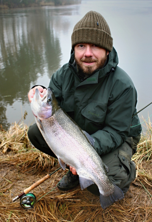 A nice rainbow trout caught from a place where was a big piece of ice few moments ago.