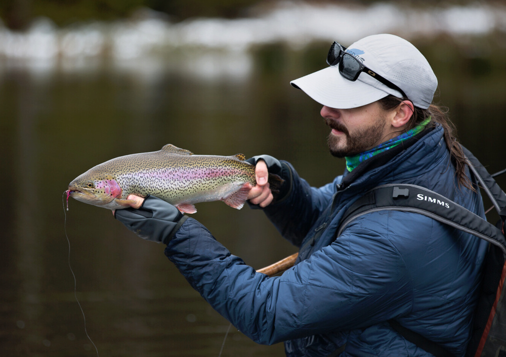Nice Decemeber rainbow trout with a pink streamer in his jaws.