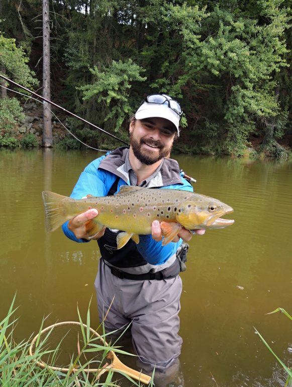 I'm really happy with this extraordinary brownie, as you can see! At the right time in the right place again. The inflow part of the lake was cloudy after a night storm and this fish was feeding on a small fry in my streamer fishing territory!
