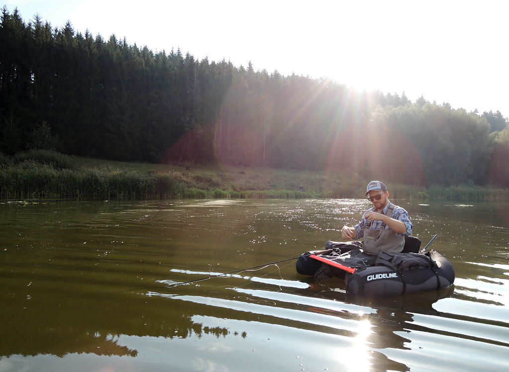 My friend Libor is just preparing a new leader after the loss a really nice fish! Non-stretchable fly lines are great because we feel the self-finer strike through them! But the moment, when a big fish takes a fly in speed, often does not end well!