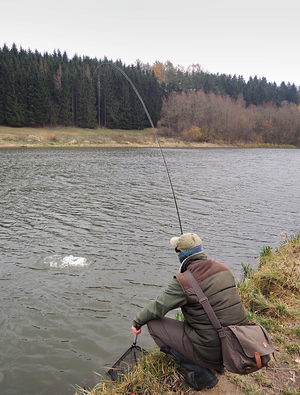 Part I. During a windy November day Jirka hooked a nice fish by the shore! But now comes the most critical part of the fight, when the fish is shakink a head at the water surface! At this time, it is best to quickly fold the rod sideways to the surface!