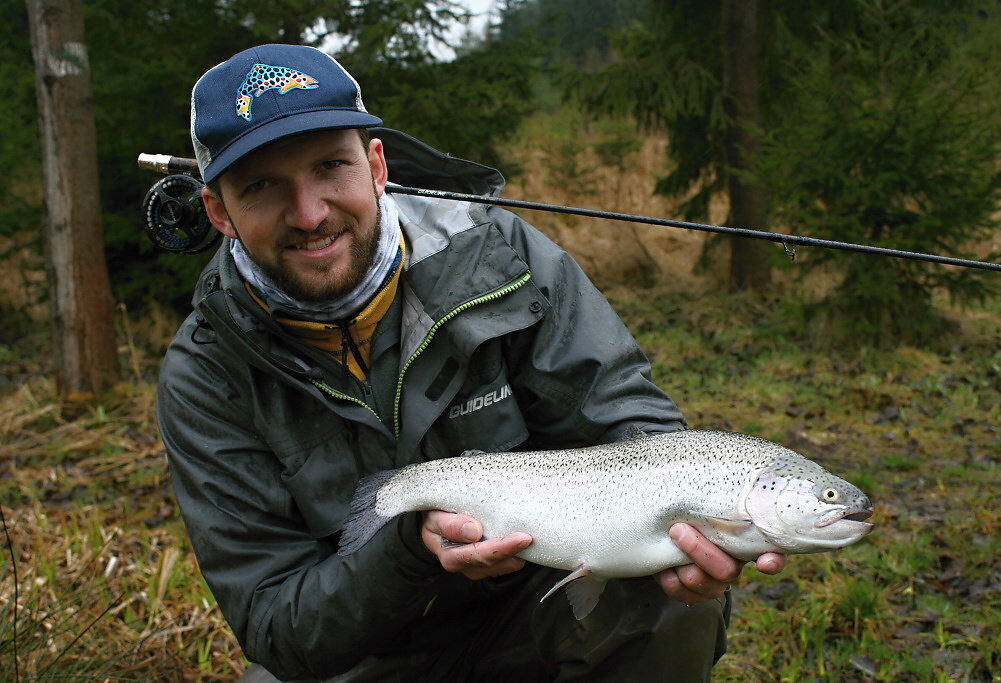 My fishing partner Libor is posing with his nice catch from the tributary of forest trout pond. These places are often visited by larger fish, looking for quieter places and underwater breaks - shallow transitions to the depths! 