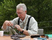Fly tying at the river bank