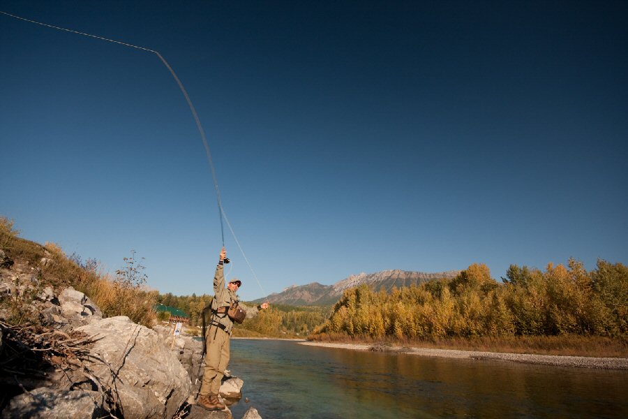 Keeping the rod high to avoid the high bank
