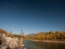 Keeping the rod high to avoid the high bank