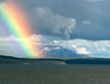 Big rainbow over Marsh Lake,Yukon, Canada
