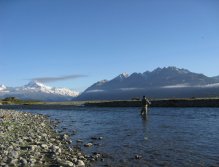 Casting flies at dawn under a snow-capped Mt.Cook