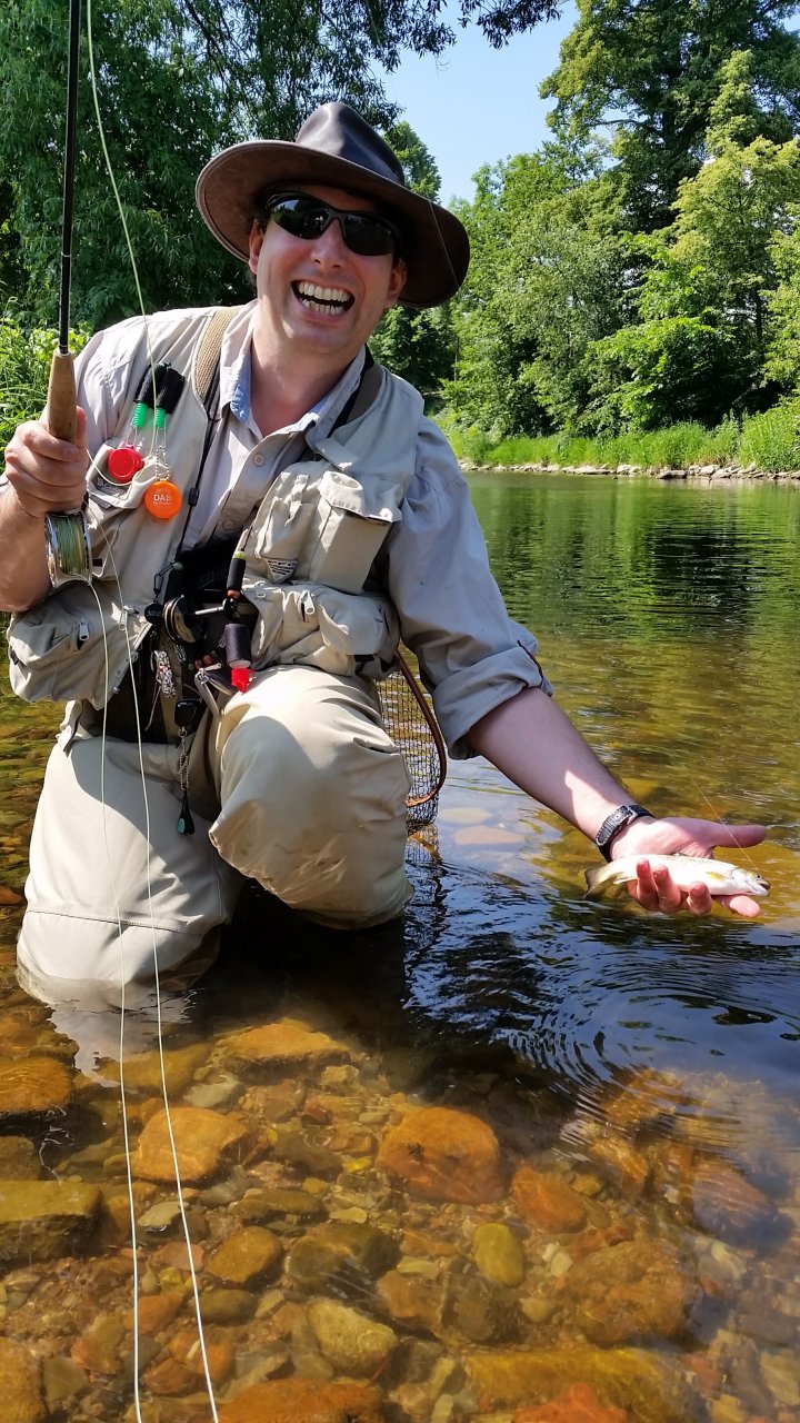 Even the little brook trout brings smile on his face...