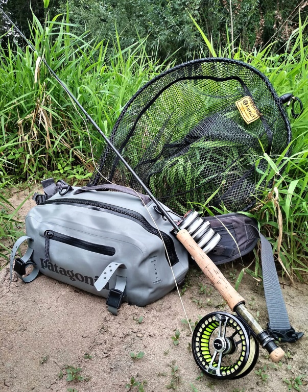 My reliable and indispensable partners in my unforgettable summer fly fishing trips on the big non-trout river!