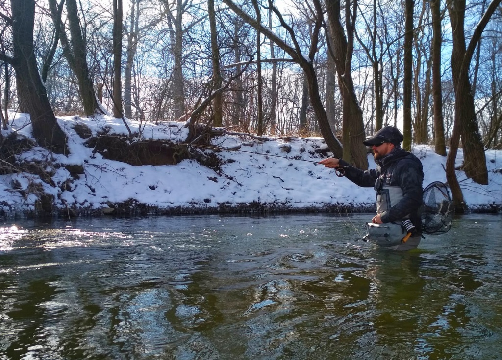 Winter romance while fishing in a clear mountain stream. In this case, warm clothes and quality fly fishing equipment are especially important!