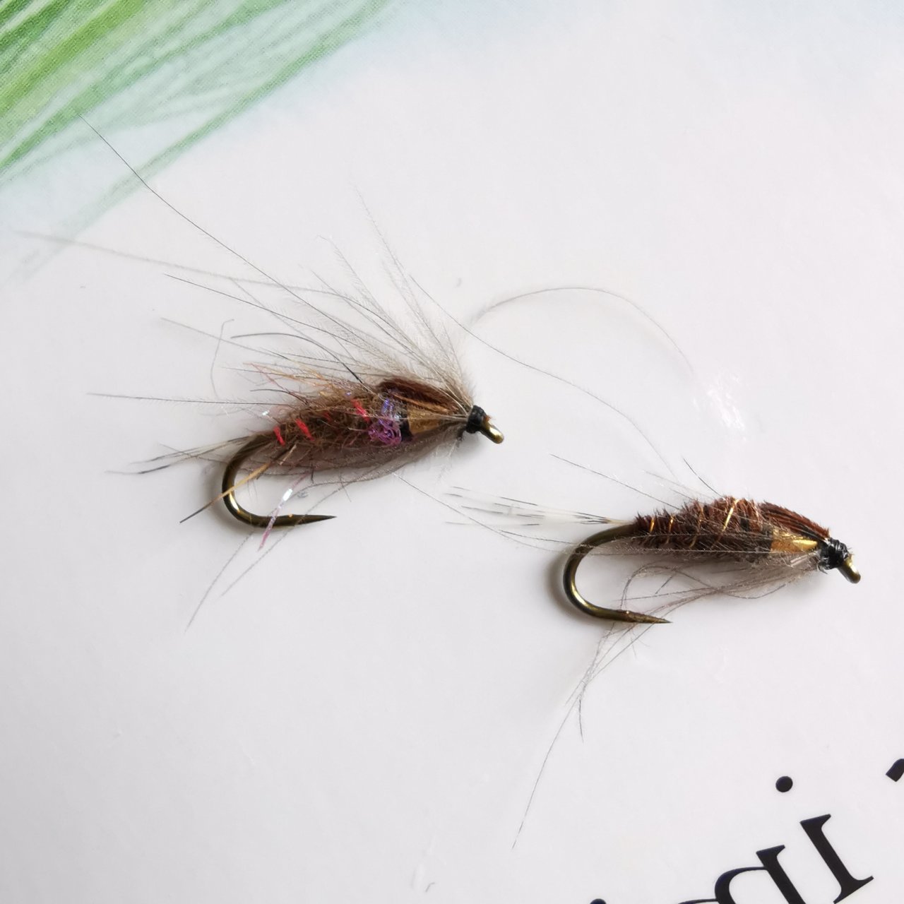 Simple mayfly nymphs with Tungsten weight OLIVE Kn�pek Hooks used in thorax.
