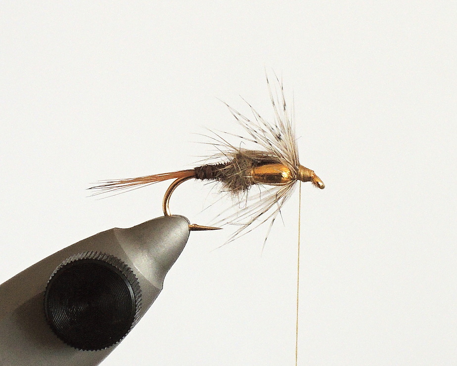 STEP 6 - Movable Hackles Tying