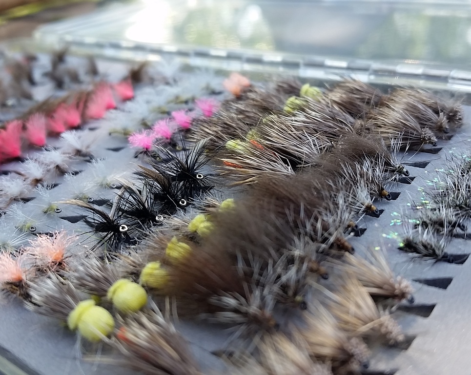 Universal small dry flies for grayling river fishing.