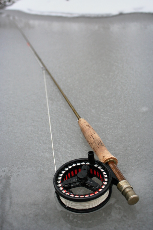 Traditional concept photo "Fish & Gear" this time without fish. If you want to take a picture of your catch in the winter, do not do it on ice or snow, which can badly "burn" the fish skin. Make photo of your fish only in water or in wet and frozen hands!