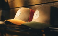 Fishing Cap Guideline Badge Trucker Forest - In Action