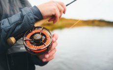 Fly Reel Guideline Aura Bronze - In Action